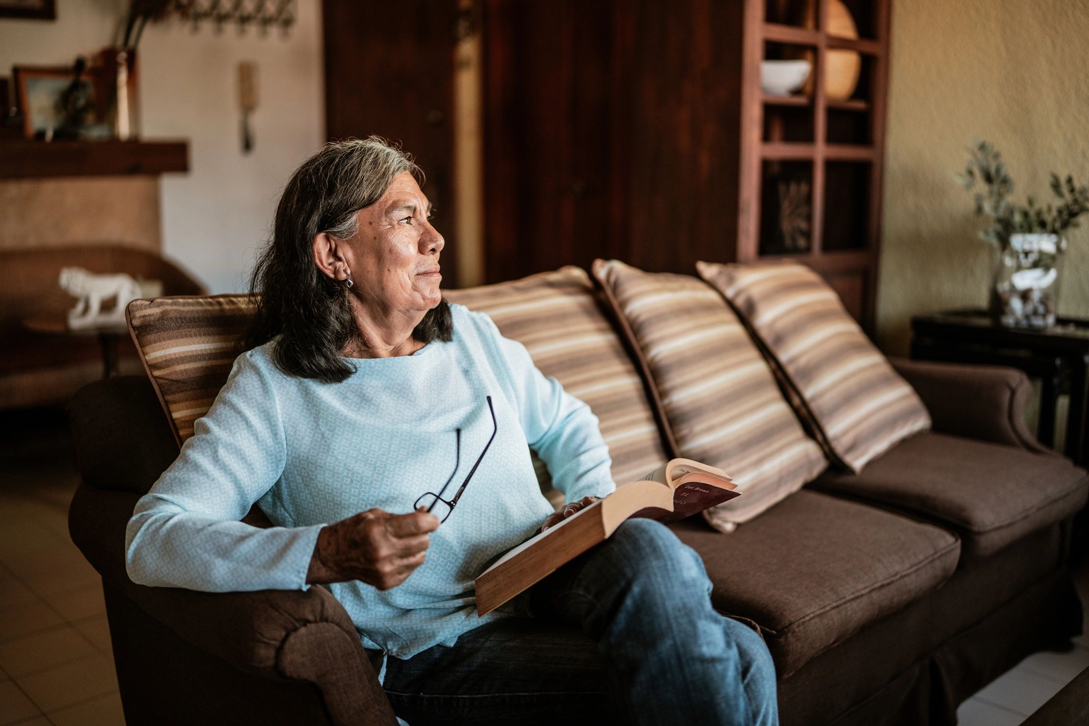 Senior woman reflecting at home